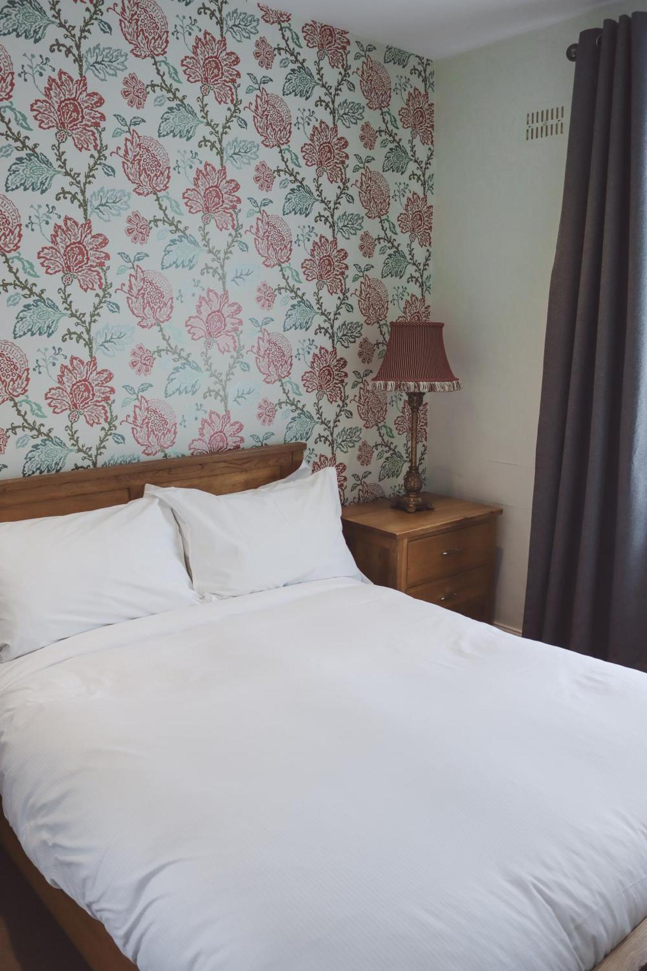 Longlands Inn & Cottages Carnforth Eksteriør bilde A bedroom at the hotel